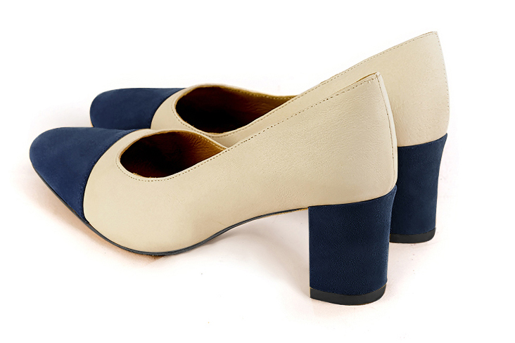 Navy blue and champagne white women's dress pumps,with a square neckline. Round toe. Medium block heels. Rear view - Florence KOOIJMAN
